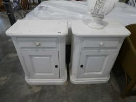 White painted bedside cupboards with single drawers