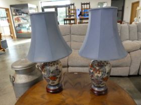 Modern pair of oriental table lanterns with blue shades