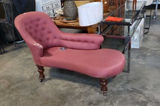 Purple button back upholstered chaise on turned mahogany supports