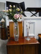 Slender glass vase and contents of artificial roses together with modern chrome floral lantern