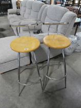 Pair of chrome bar stools by Sandler, with circular wooden seats