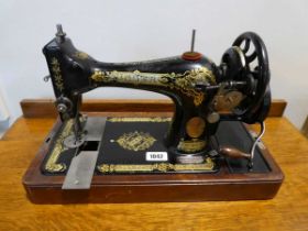 Wooden cased Singer sewing machine, serial no Y5523167