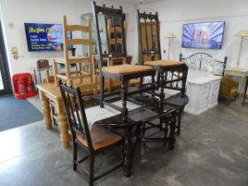 Stained pine extending dining table with turned legs and corresponding place mats, together with 4