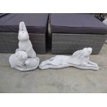 Trio of concrete rabbits