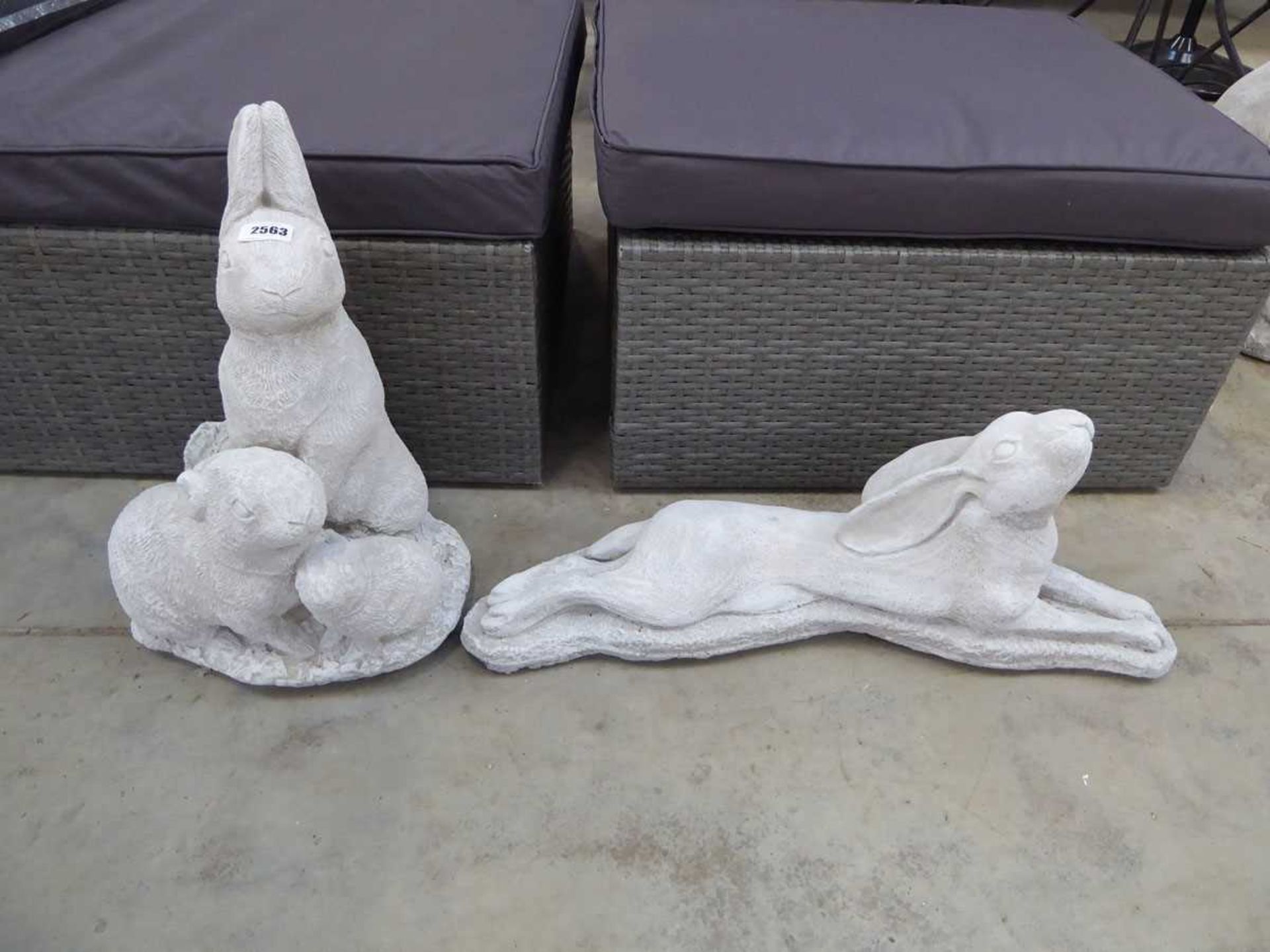 Trio of concrete rabbits