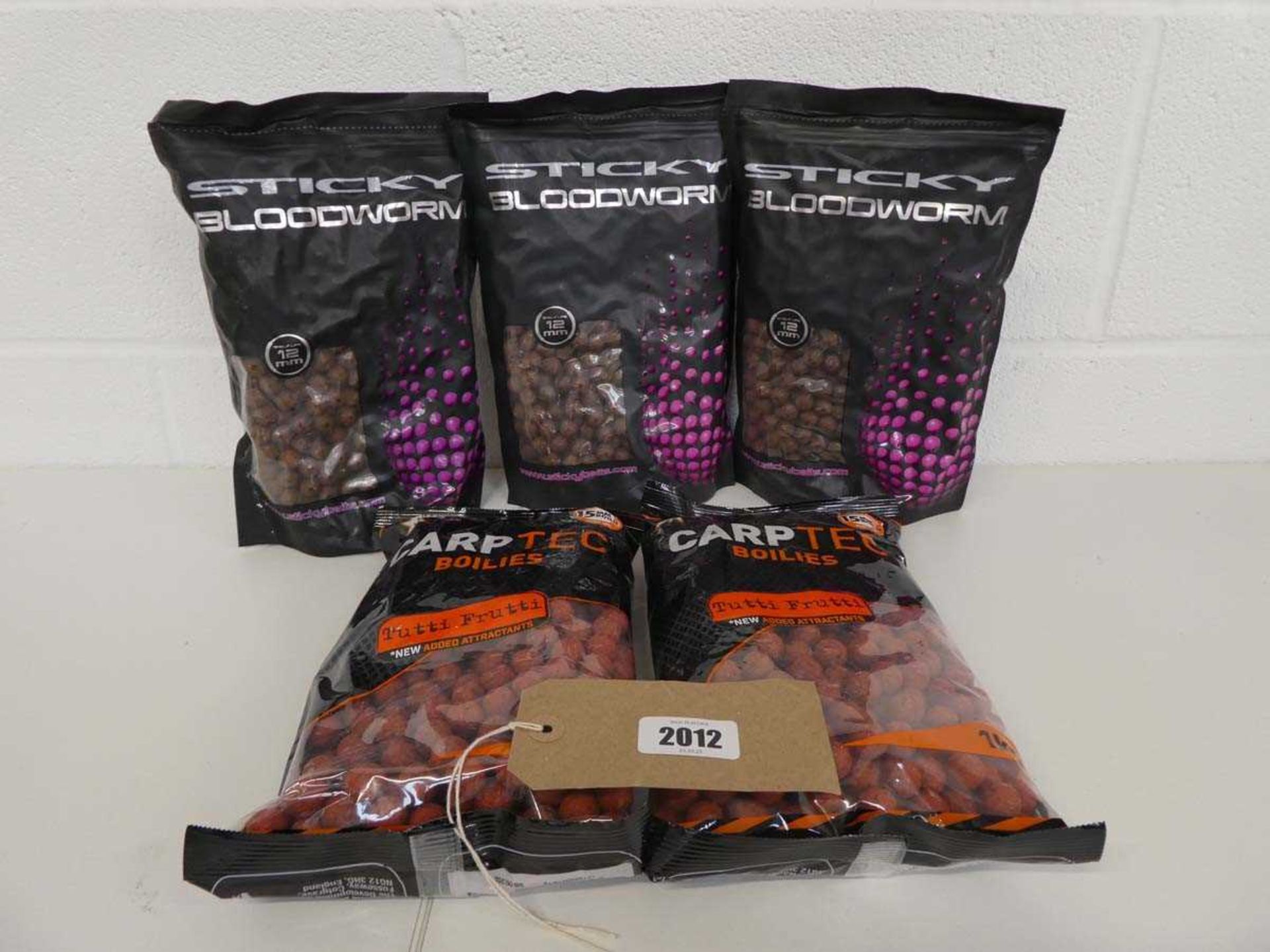 3 packs of Sticky bloodworm boilies (12mm) with 2 bags of Dynamite Carp Tec boilies in tutti-