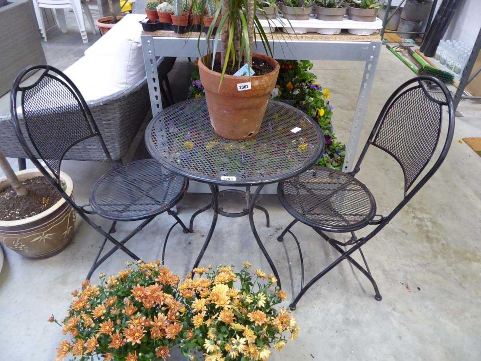 Black mesh three piece garden bistro set, two chairs and a table