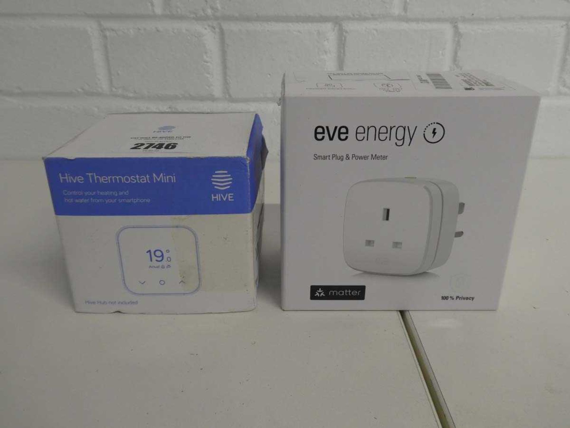 +VAT Boxed Hive mini smart home thermostat with boxed Eve energy smart plug and power meter