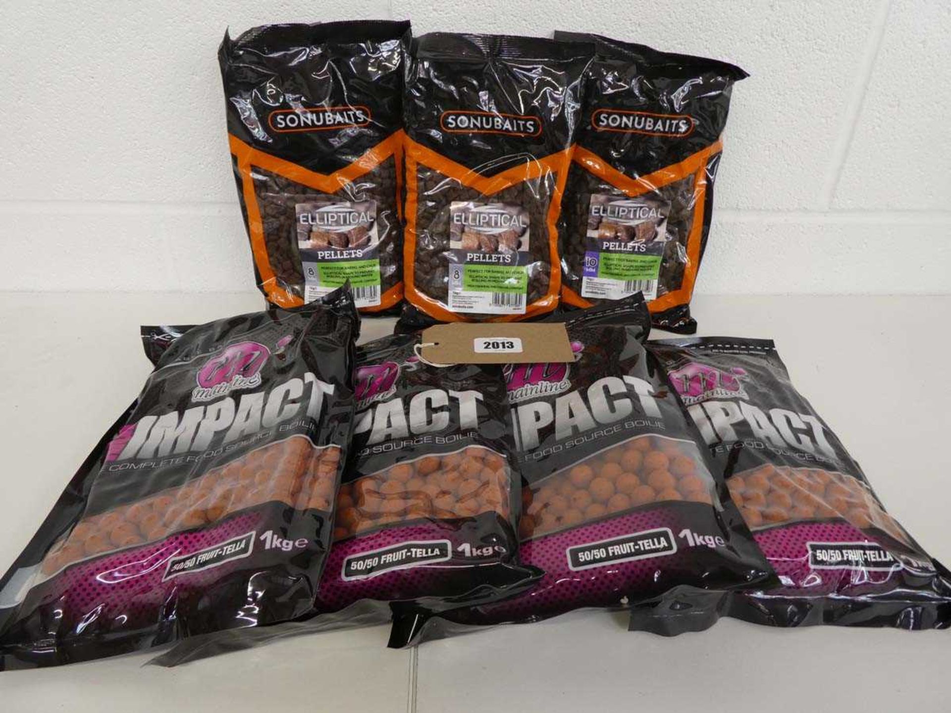 4 bags of Mainline high impact boilies (1kg) in fruit-tella flavour with 3 bags of Sonubaits fishing