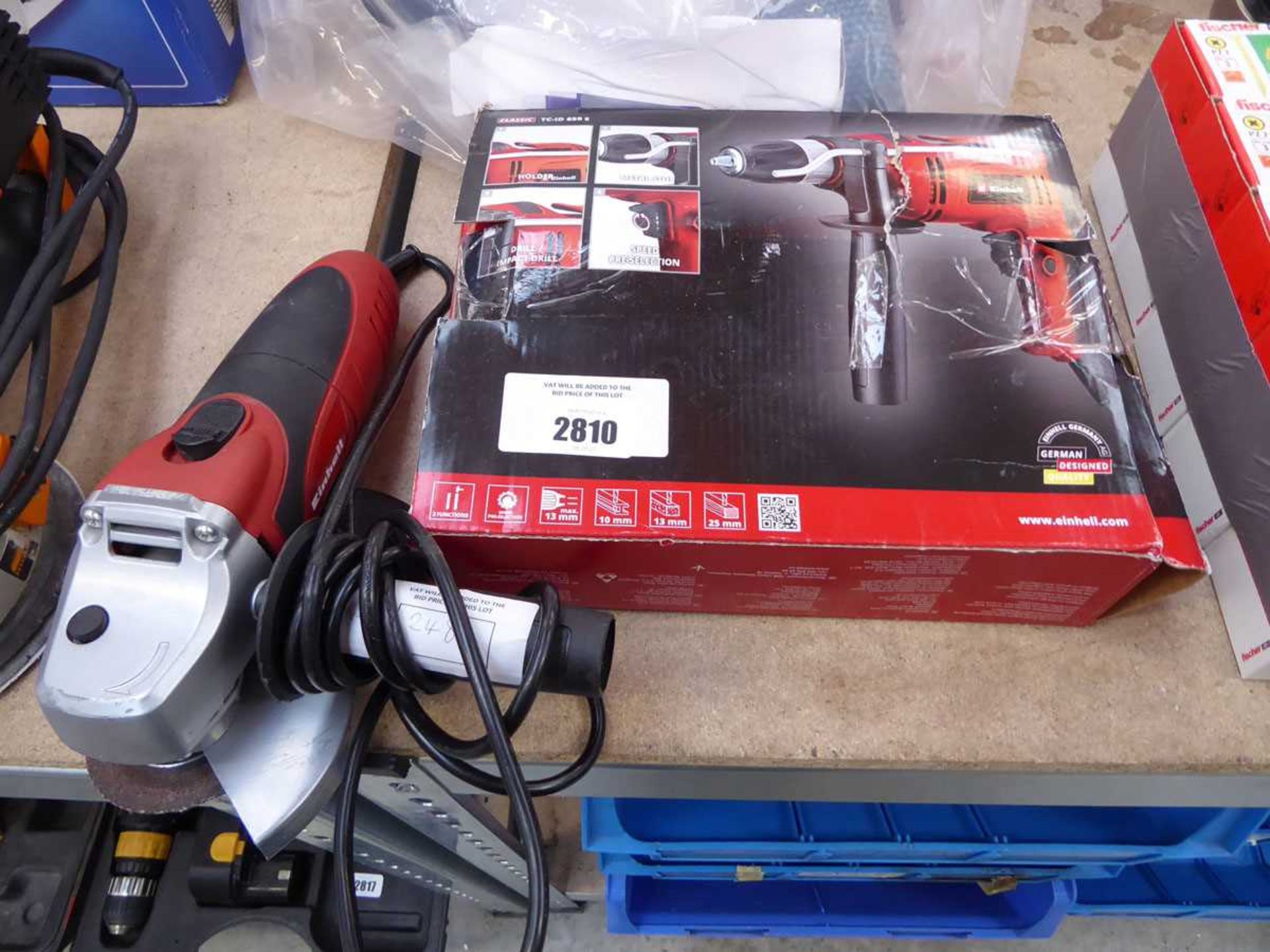 +VAT Einhell impact drill, boxed, together with an unboxed angle grinder