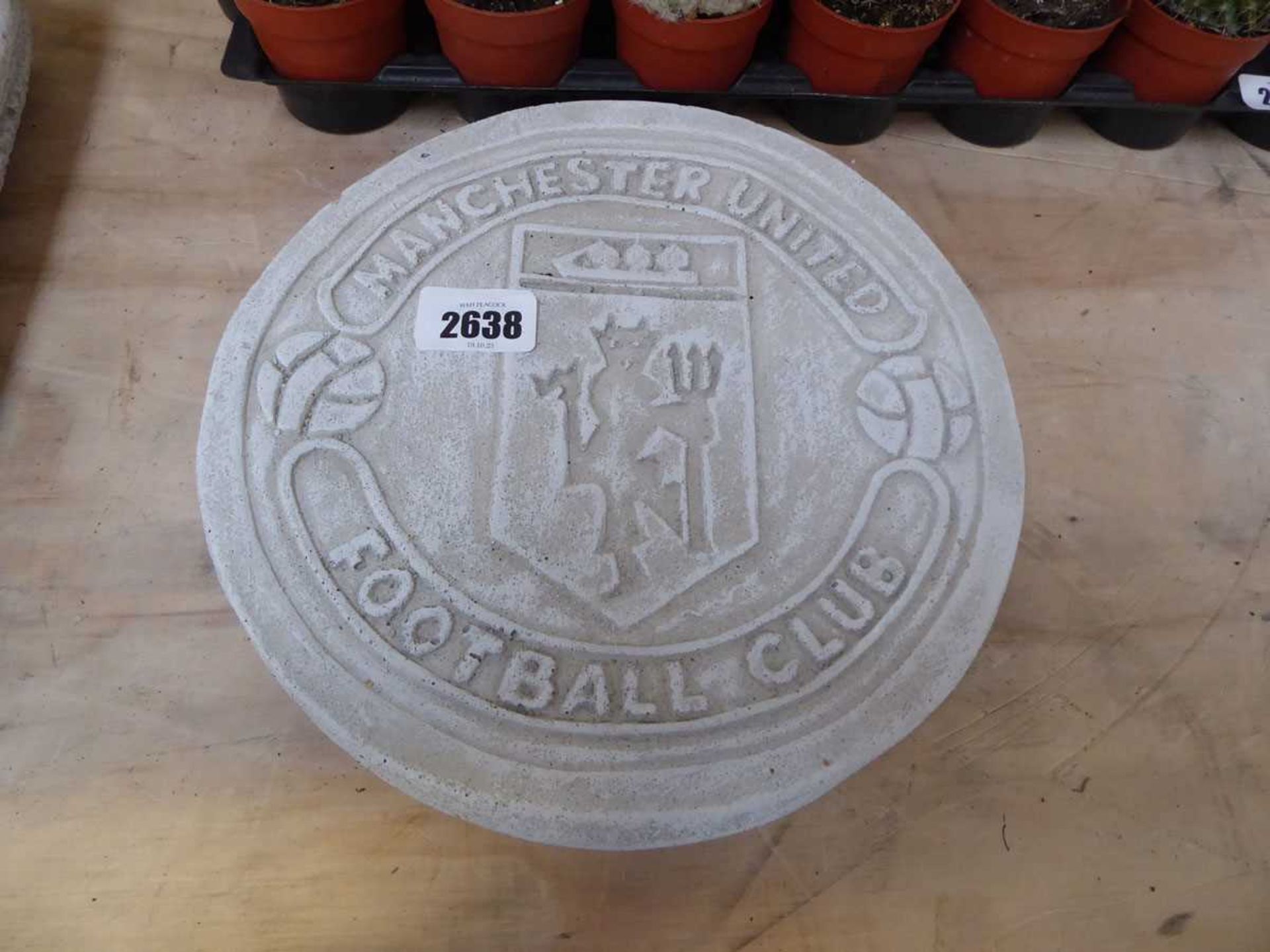 Manchester United football club concrete wall plaque