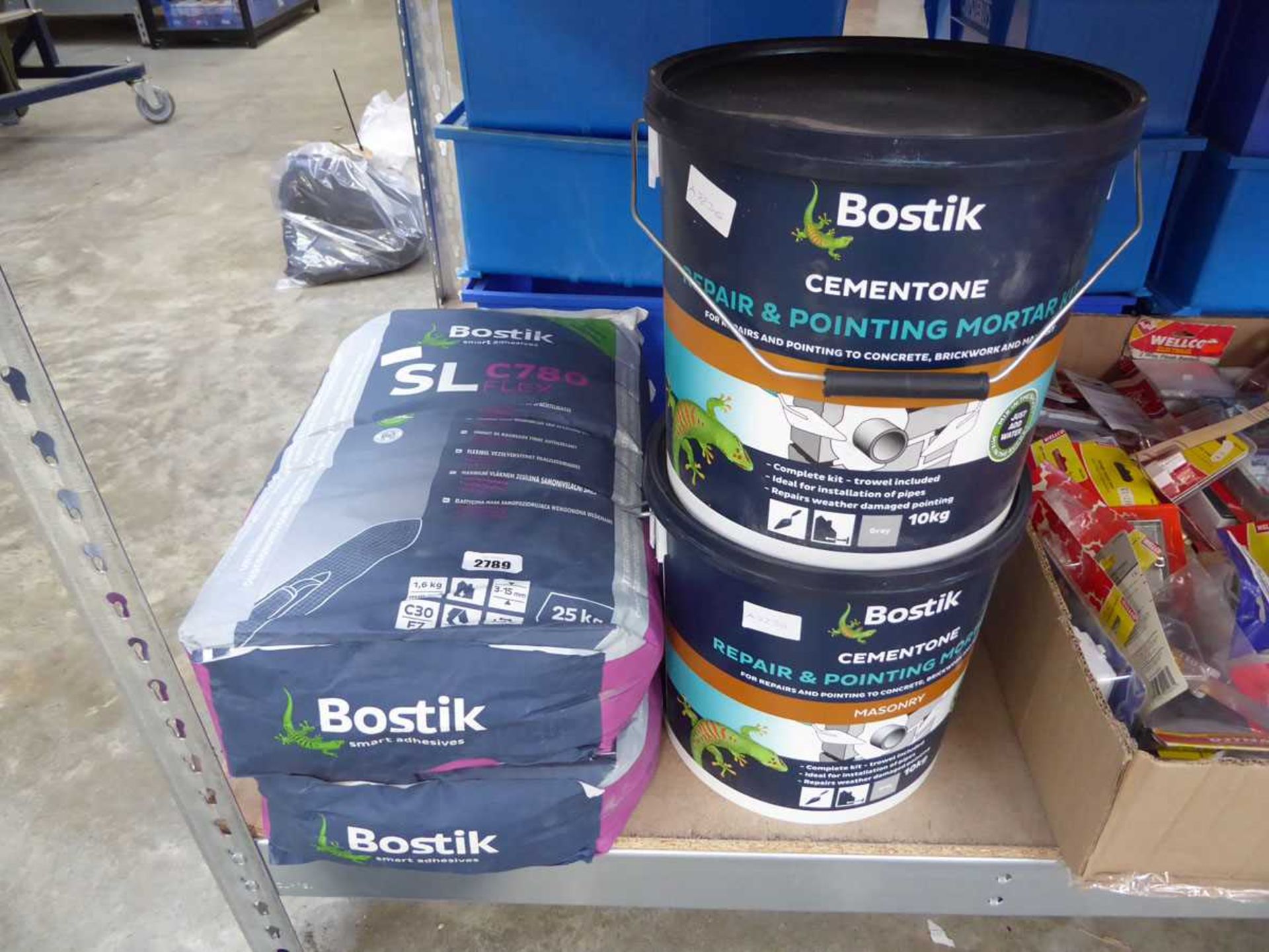 2 25kg bags of Bostik SLC780 adhesive with 2 10kg tubs of Bostik repair and pointing mortar concrete