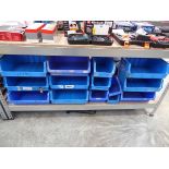 9 large blue plastic linbins with 5 smaller linbins