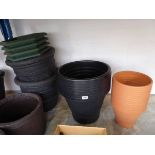 8x 47.5cm round black plastic planters together with 15x 30cm round Ascot planters