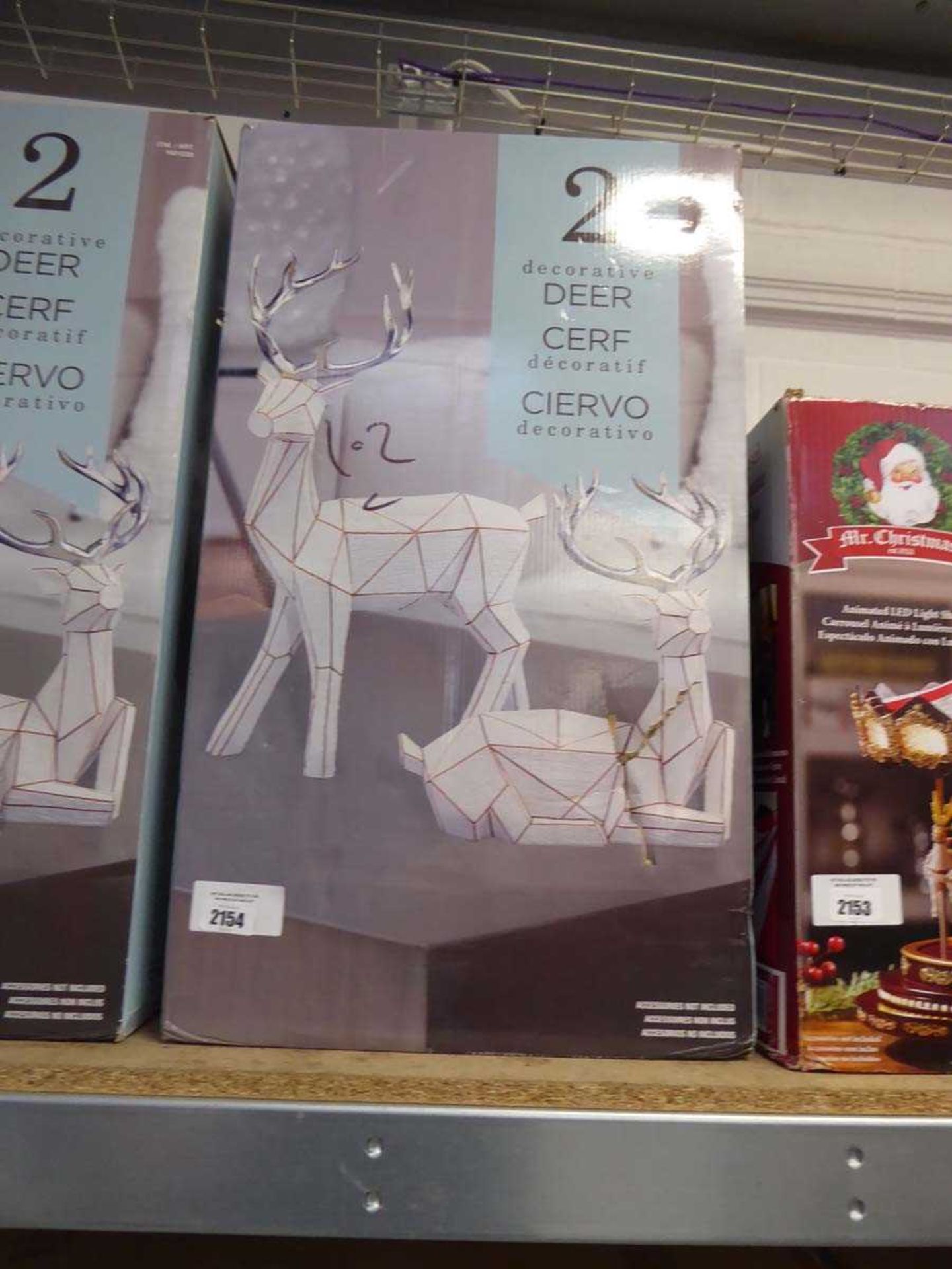 +VAT 2 boxed silver, white and gold decorative deer sets