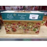 +VAT Boxed set of 6 Christmas themed brass candle holders