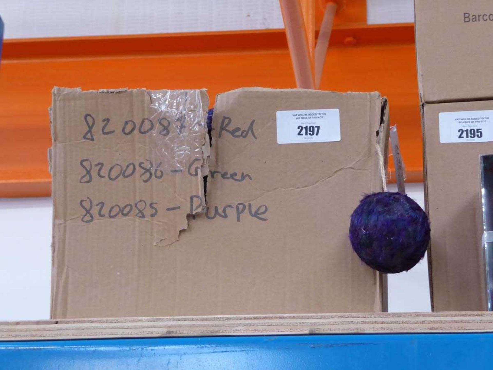 +VAT Box containing purple, red and green fabric feathered baubles