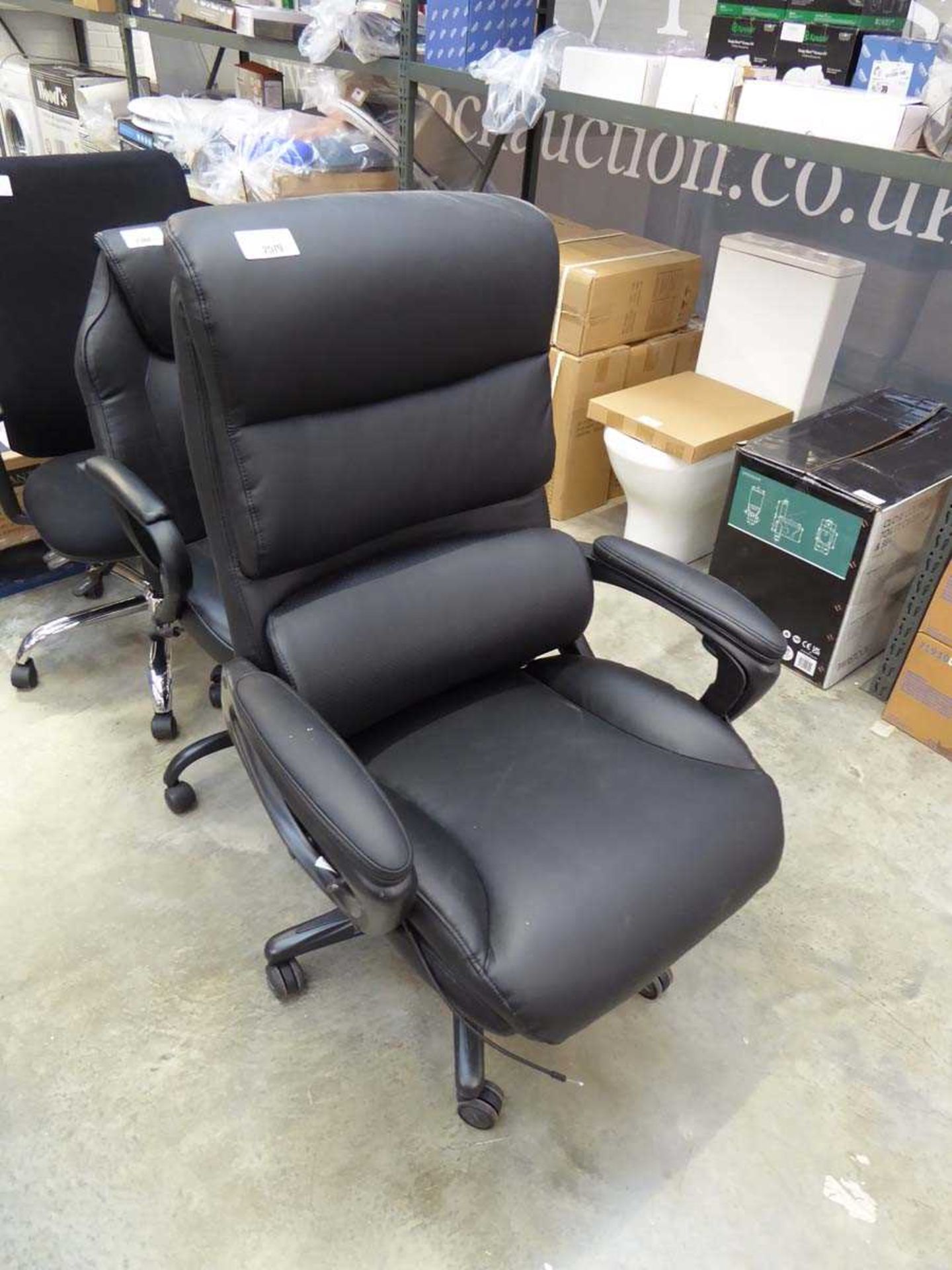 +VAT Lazy boy black leatherette twin armed office arm chair (please note no bolts)