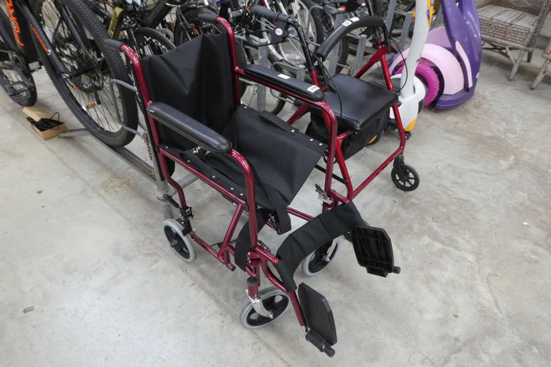 Red and black collapsible wheelchair