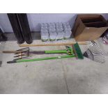 Garden rake, garden fork, hard bristle yard brush and Moulton Mill hoe