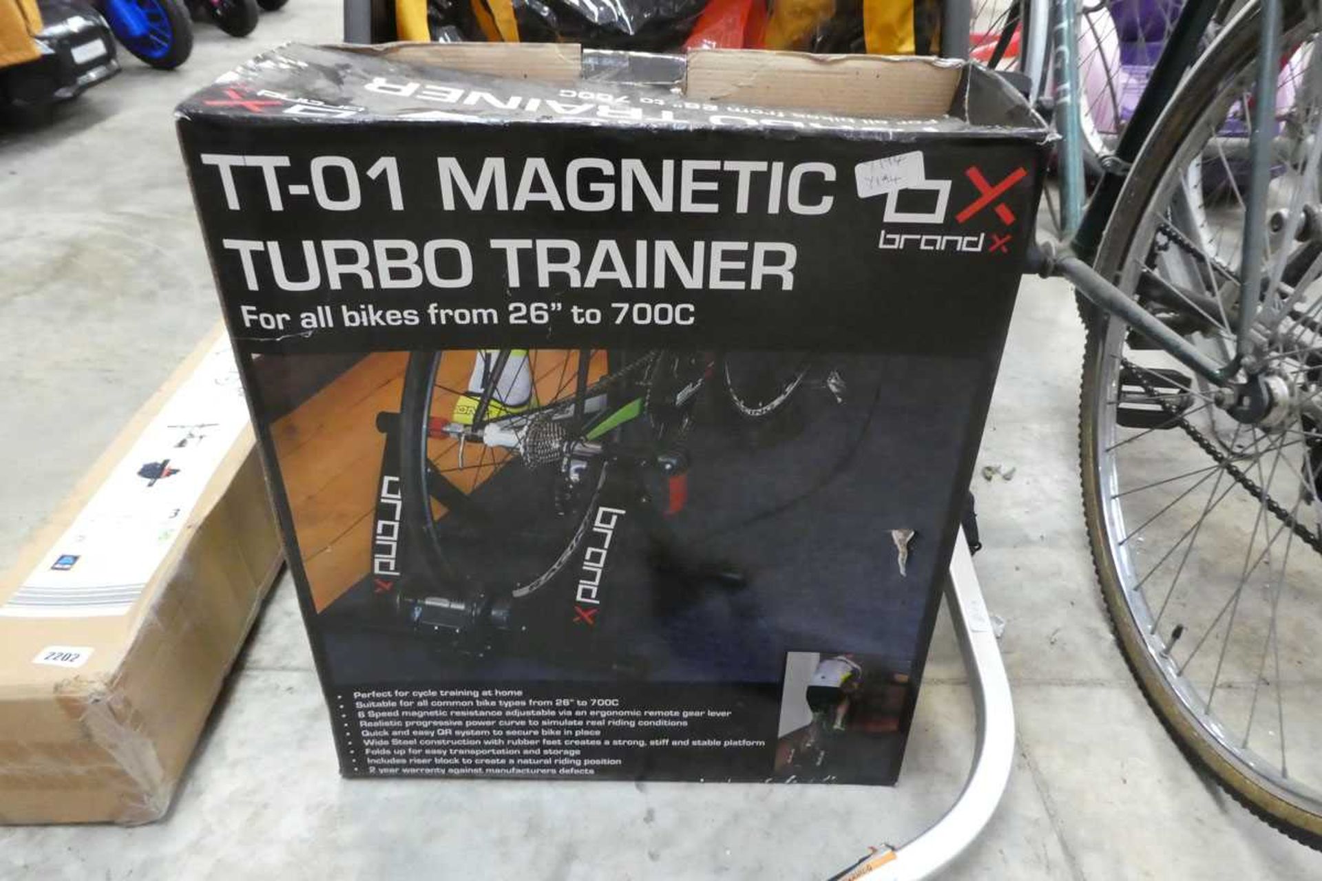 Boxed Brand X magnetic bike turbo trainer