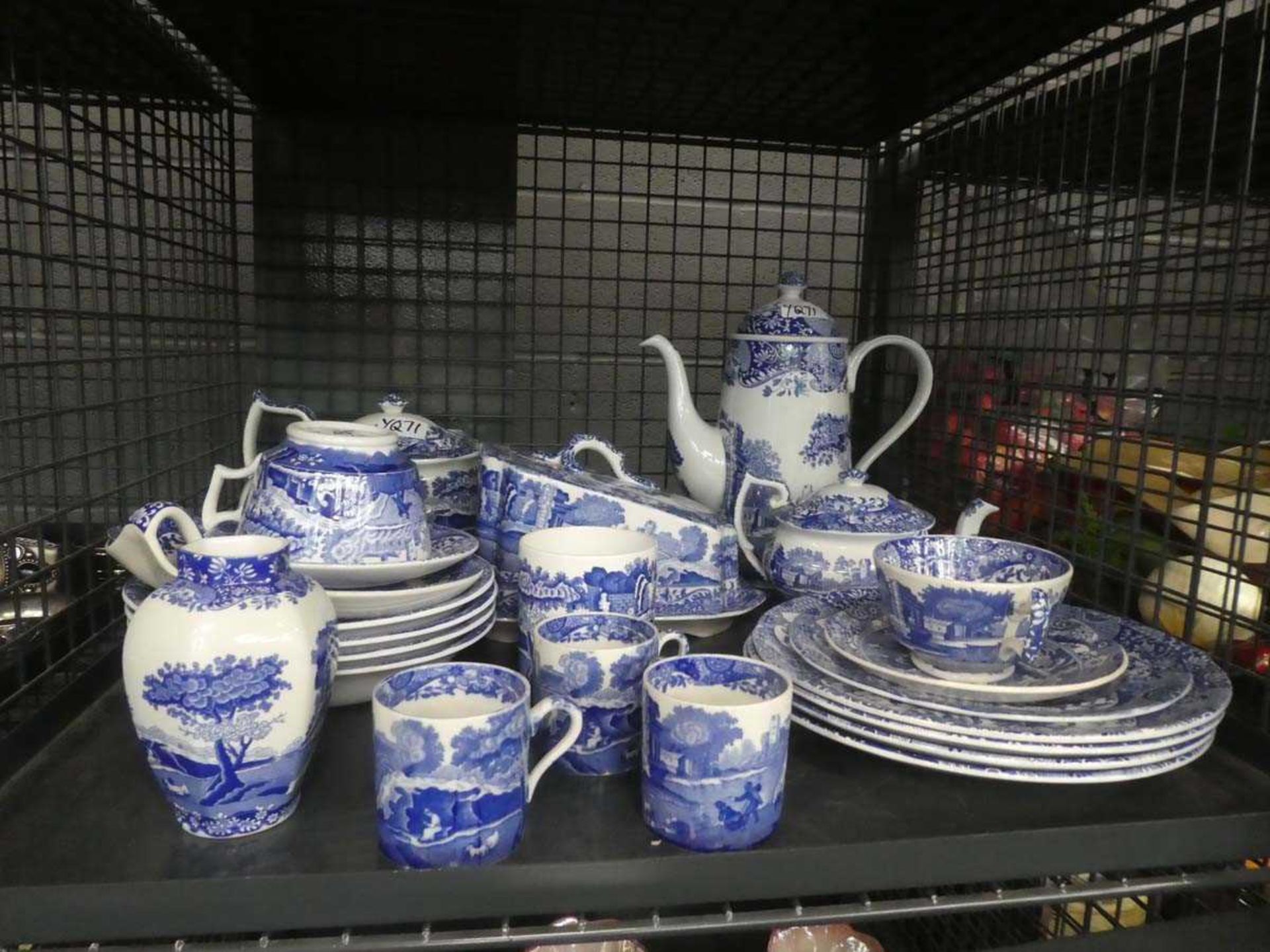 Cage containing a quantity of blue and white Spode crockery