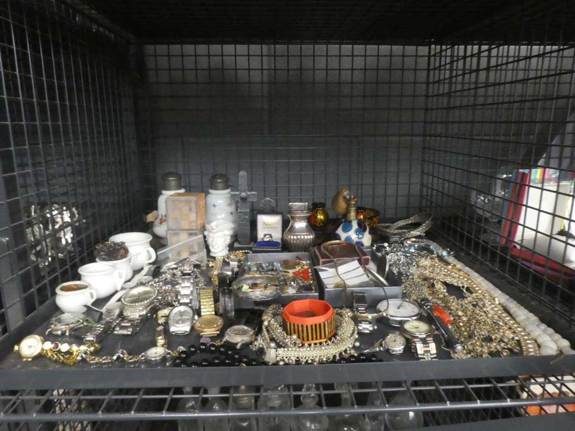 Cage containing costume jewellery, wristwatches, table lighter and an atomiser