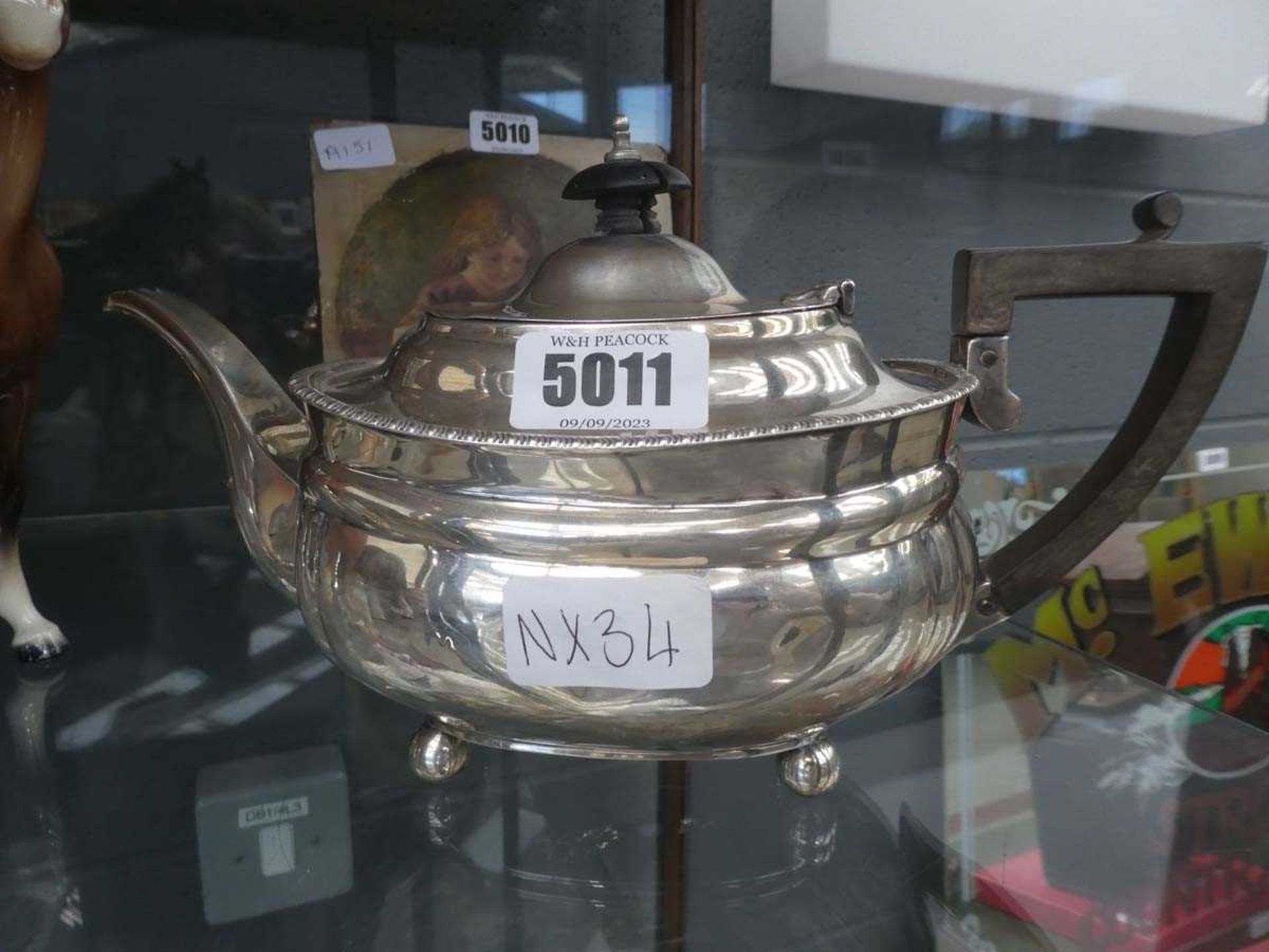 Silver teapot, hallmarked 1912, London