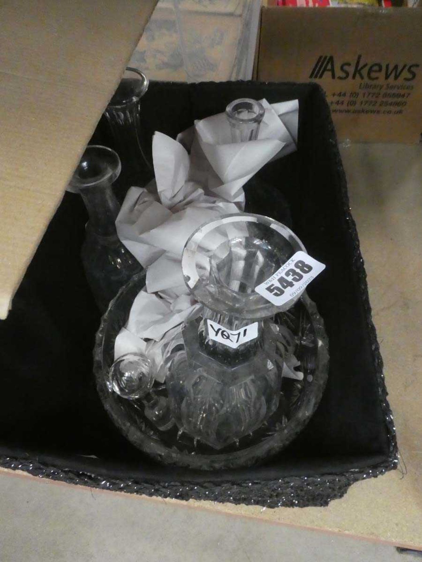 Box containing decanters and a fruit bowl