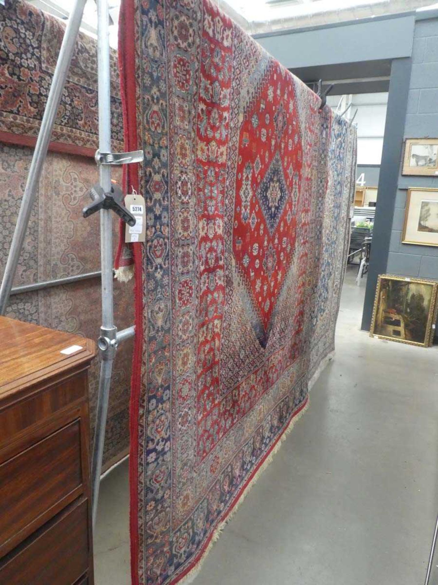(3) Large red floral carpet with central medallion