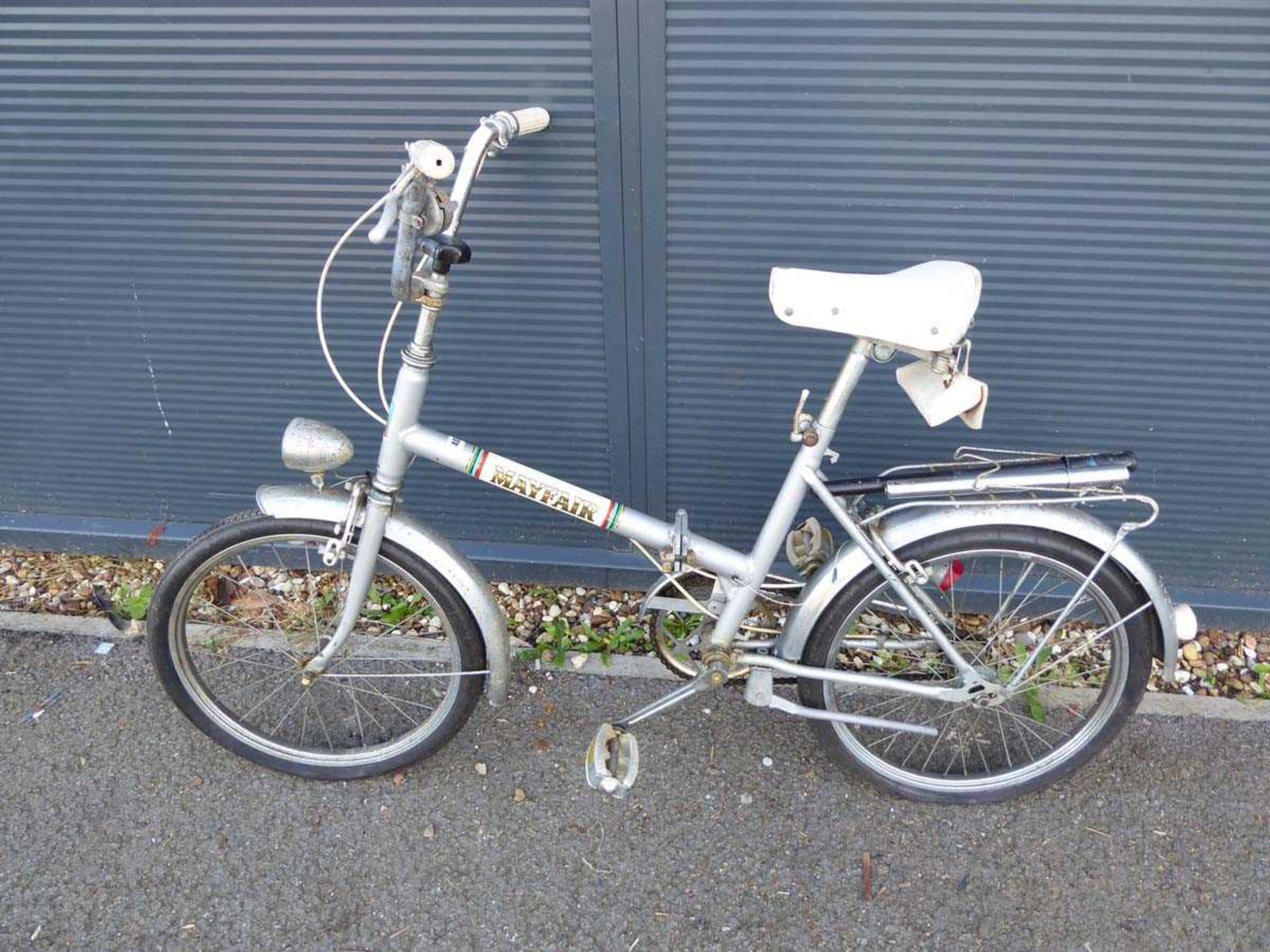 Silver and white Mayfair fold up bike