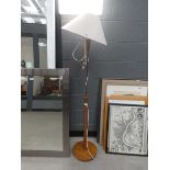 Metal and turned wooden floor lamp with shade