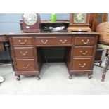 Shoolbred kneehole desk with gallery