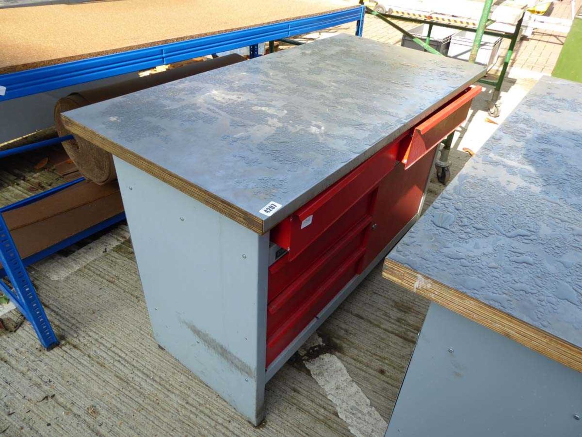 Red and silver metal workbench