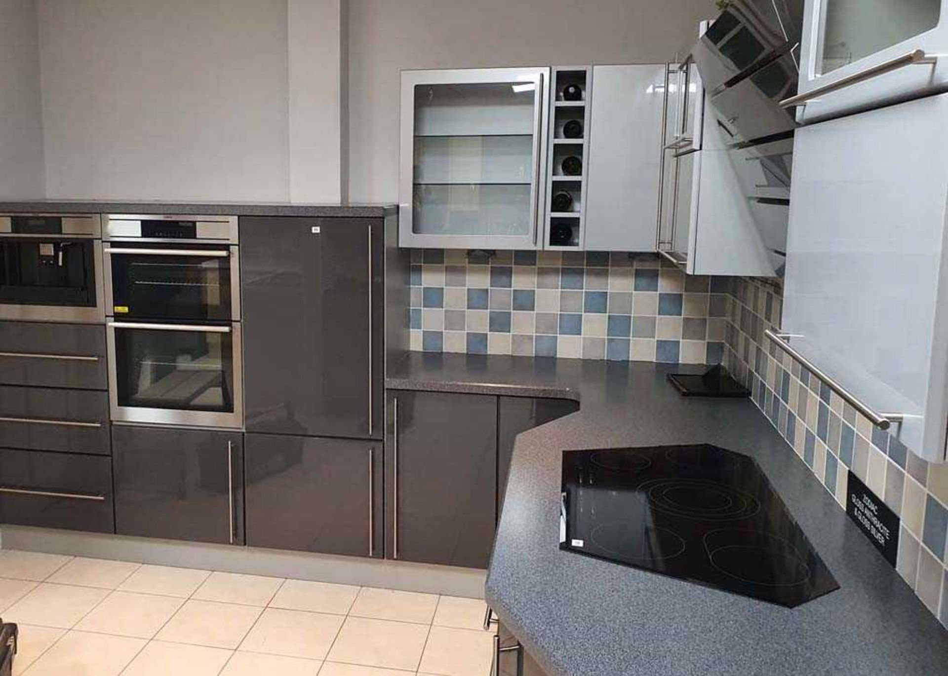 Zodiac Gloss Anthracite and Gloss silver kitchen in L shape with a granite effect worktop. Max - Image 2 of 7