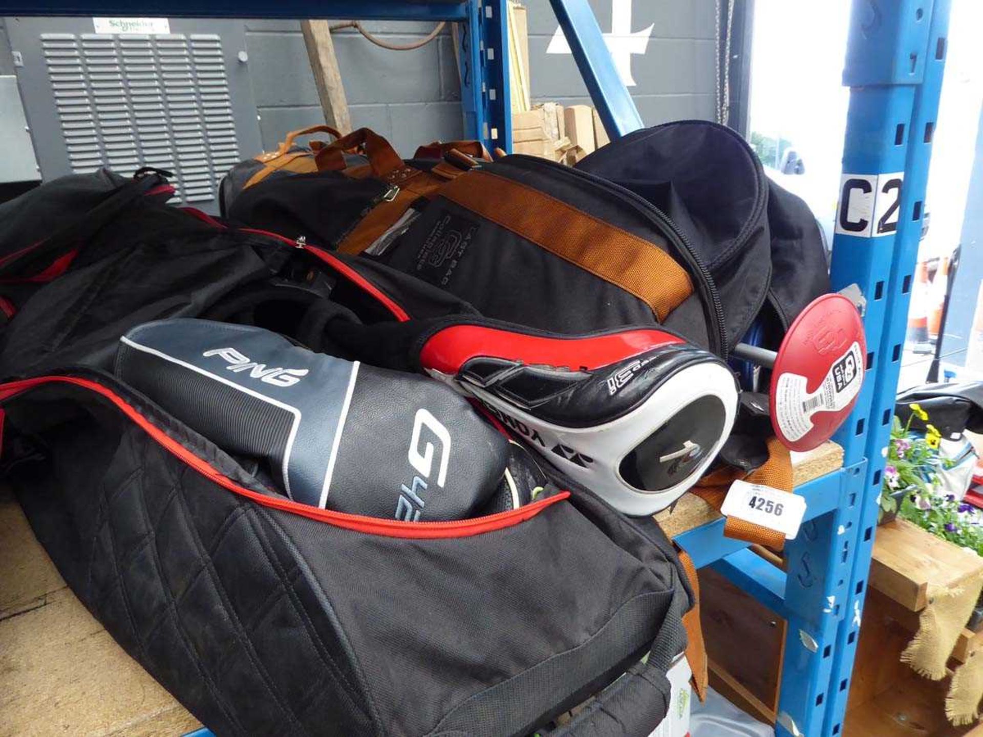 +VAT 2 golf holdalls containing 2 bags and quantity of assorted clubs inc. Callaway, Ping, Scotty