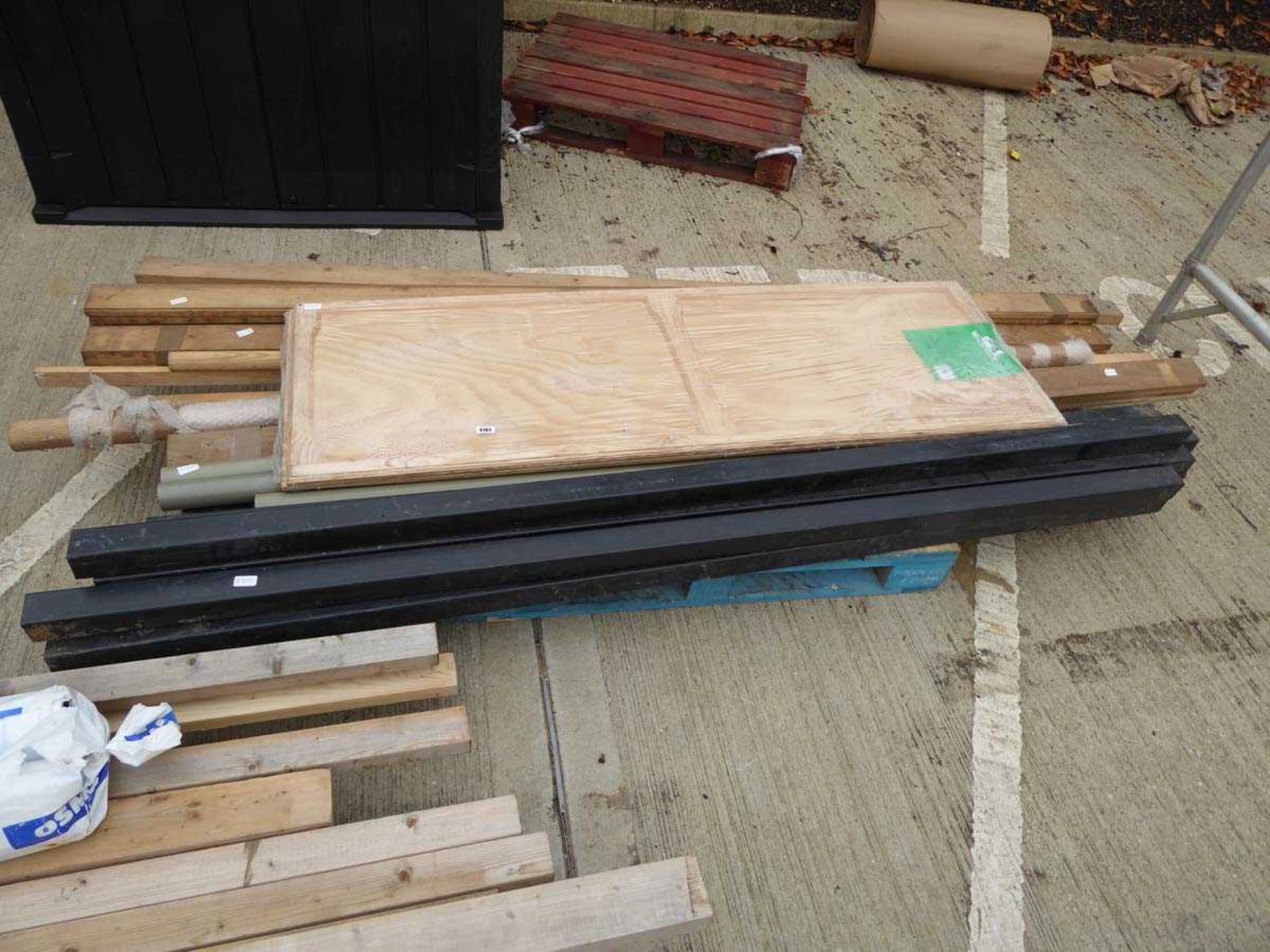 Pallet containing piece of timber, plastic guttering, cabinet doors, banister rail etc.