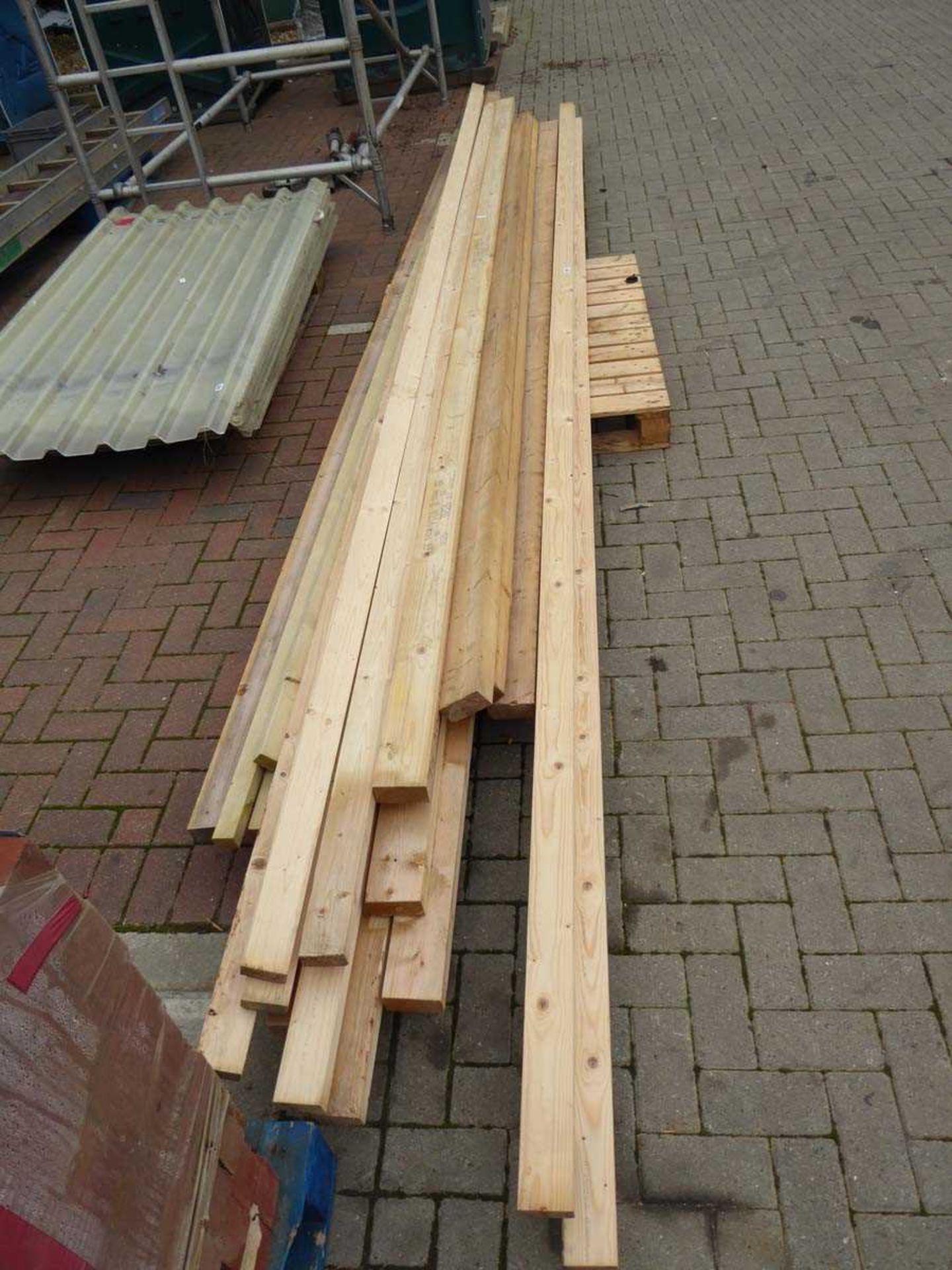 Pallet of long lengths of timber