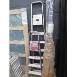 Two sets of step ladders