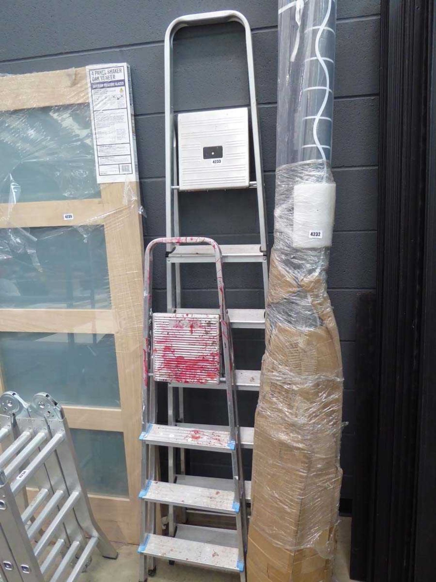 Two sets of step ladders