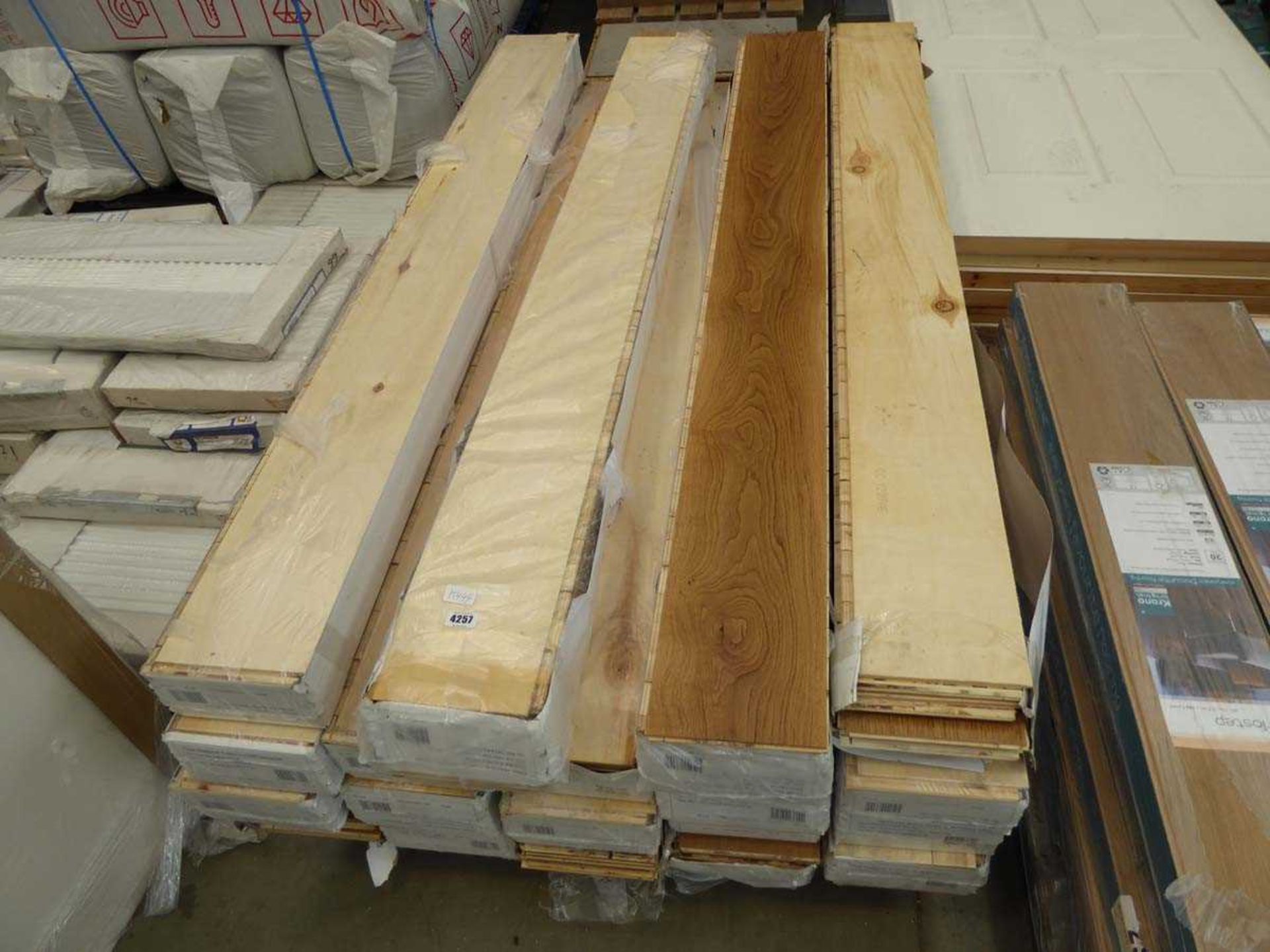 Pallet of long lengths of oak nature strip mat lacquer wood flooring