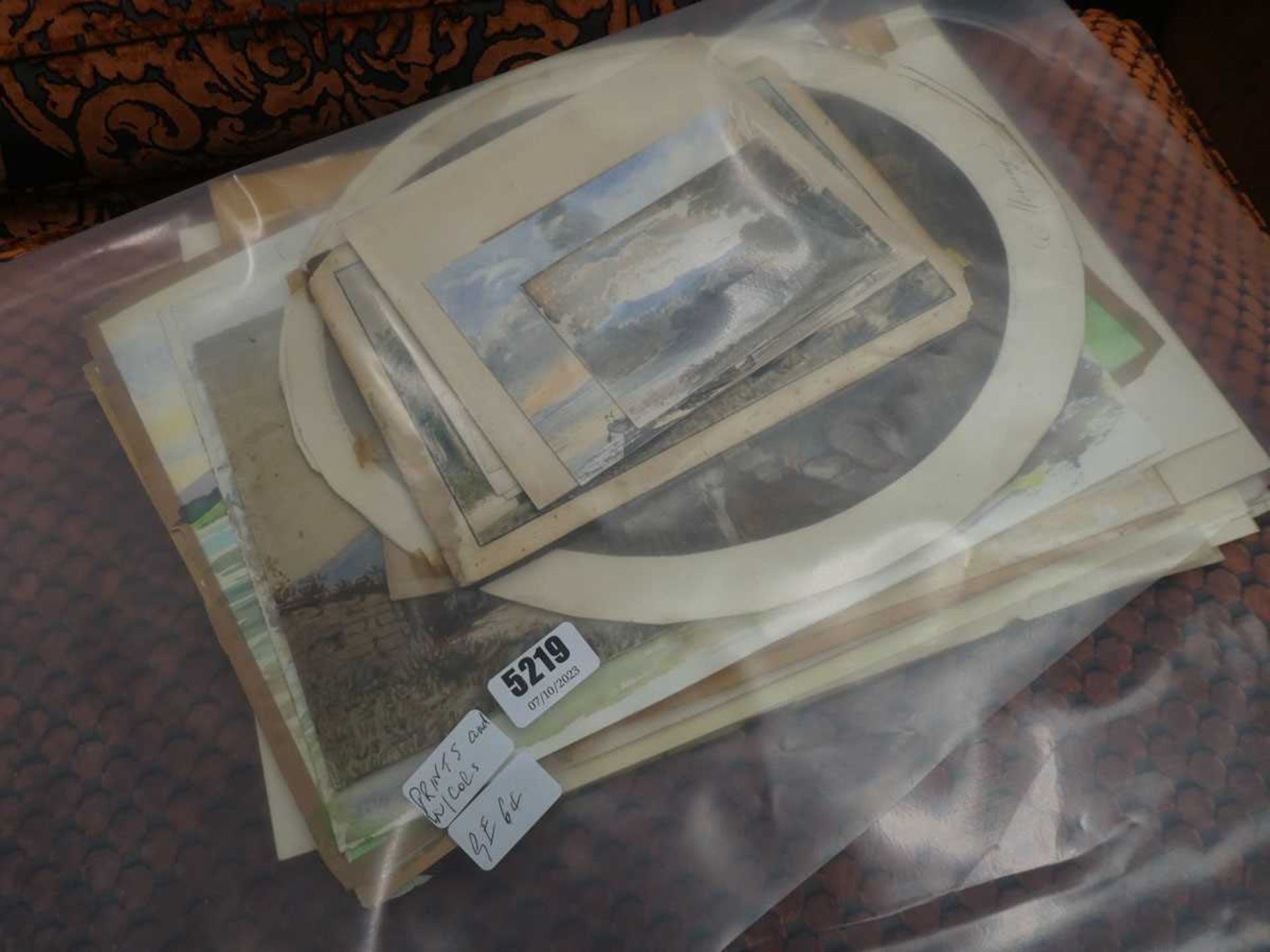 Bag containing a quantity of loose watercolours and prints