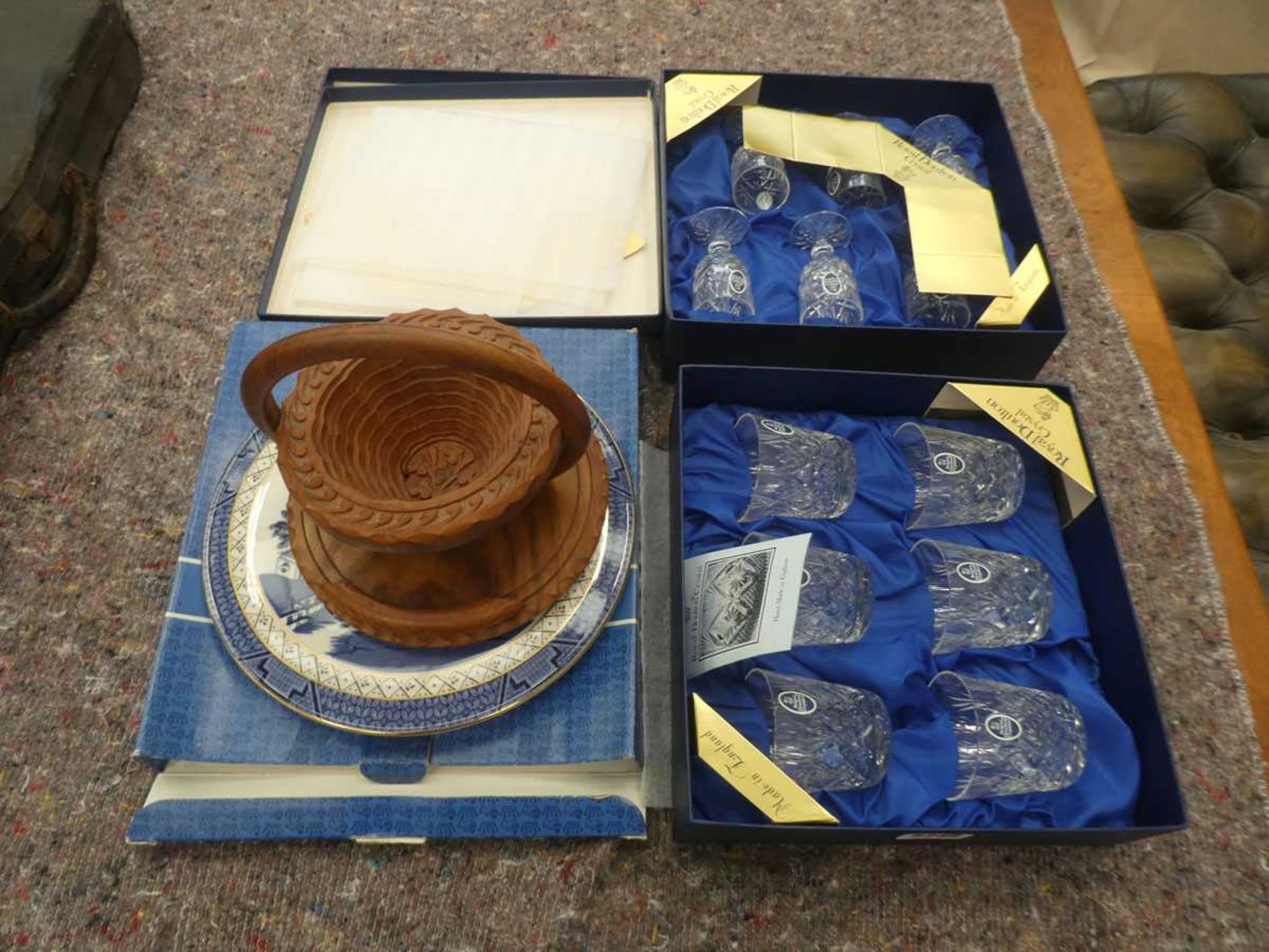 Two boxed sets of Royal Doulton Crystal glasses plus a blue and white Doulton cake plate and a