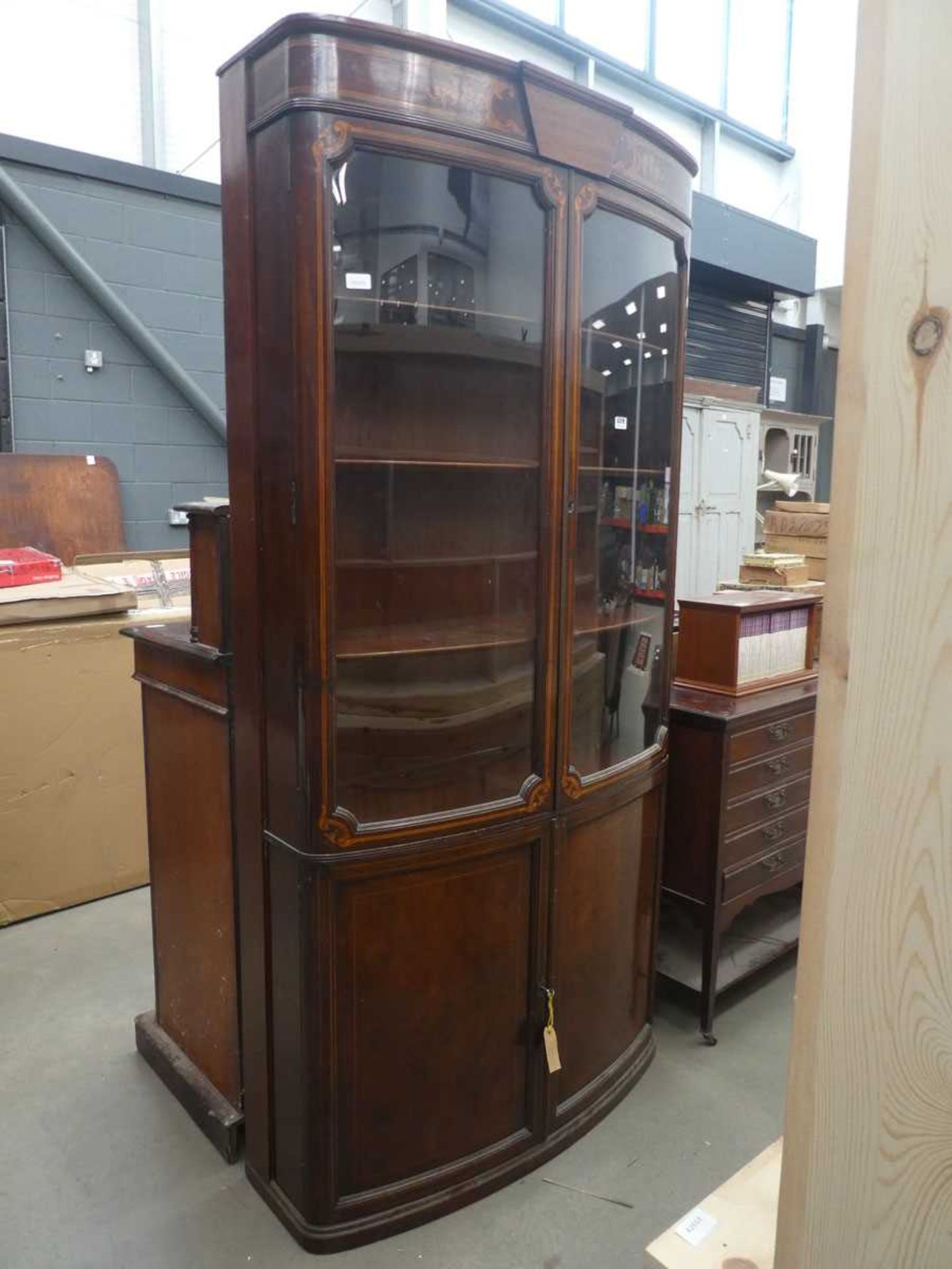 Bow fronted Edwardian cabinet
