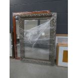 Rectangular bevelled mirror in gilt floral frame