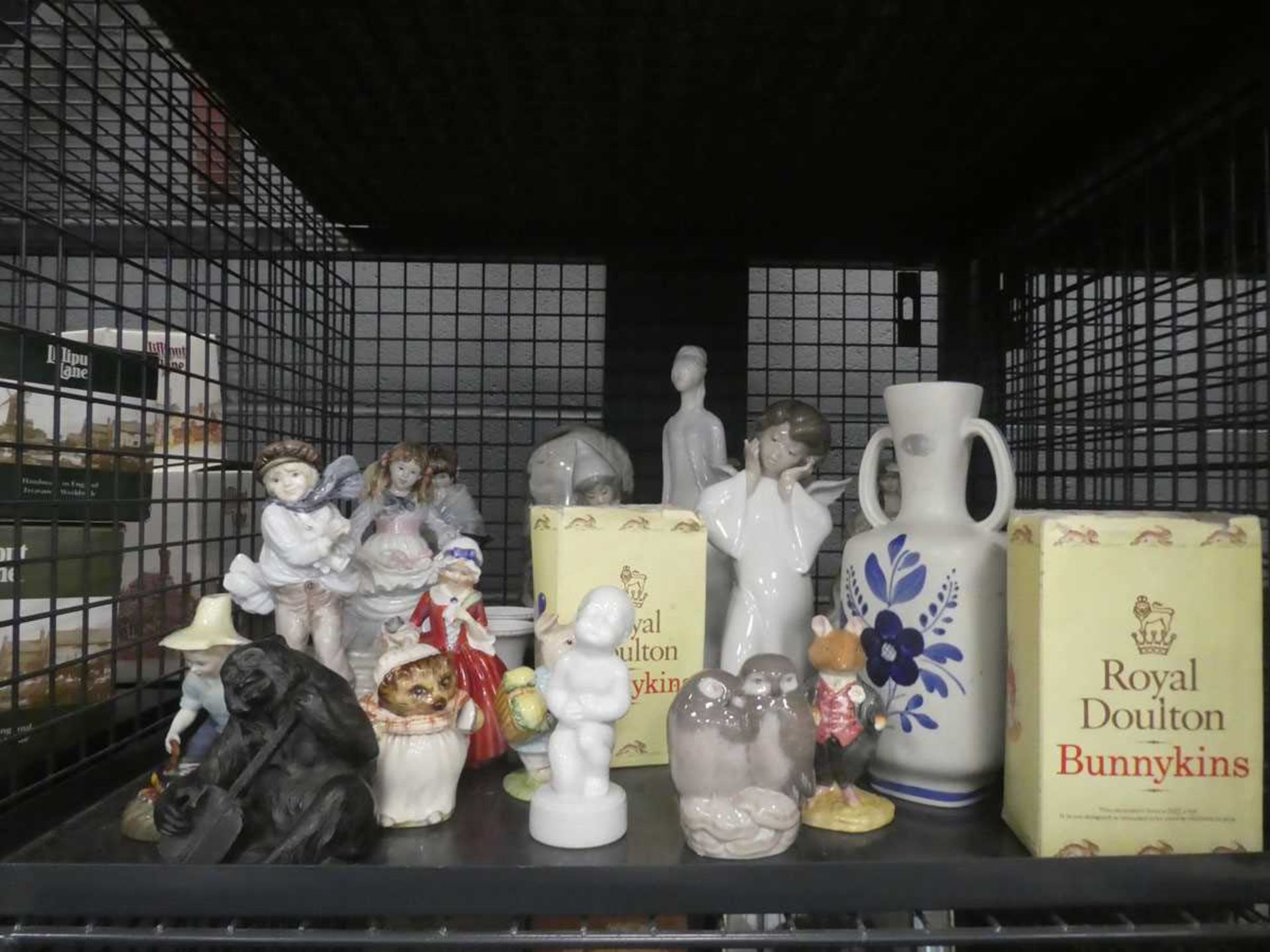 Cage containing Beswick and Doulton Beatrix Potter figures, Royal Copenhagen figure of owls,