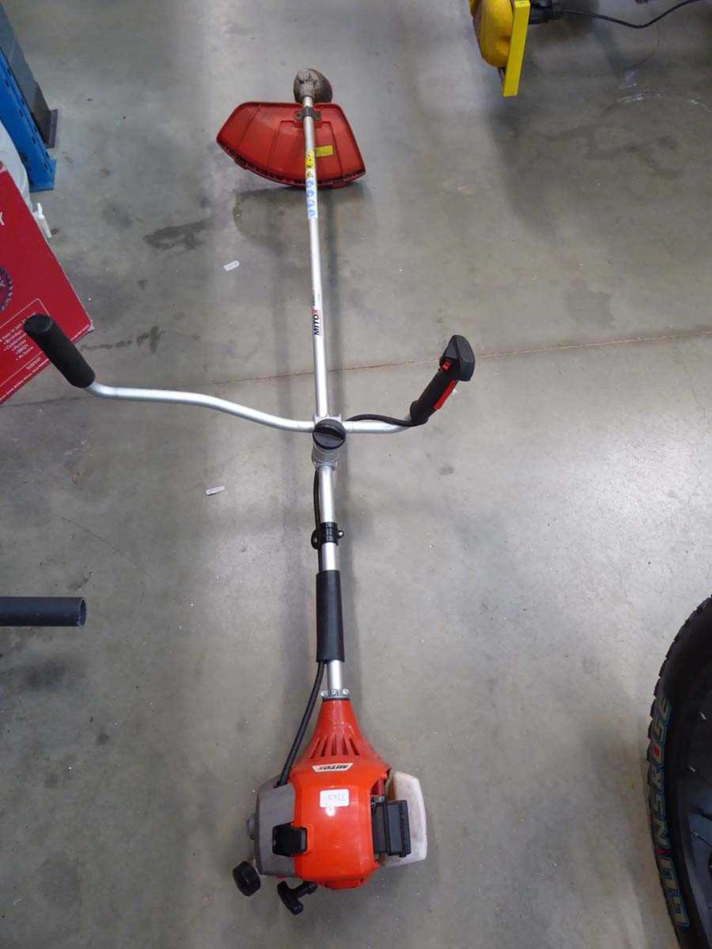 Mitox petrol powered strimmer