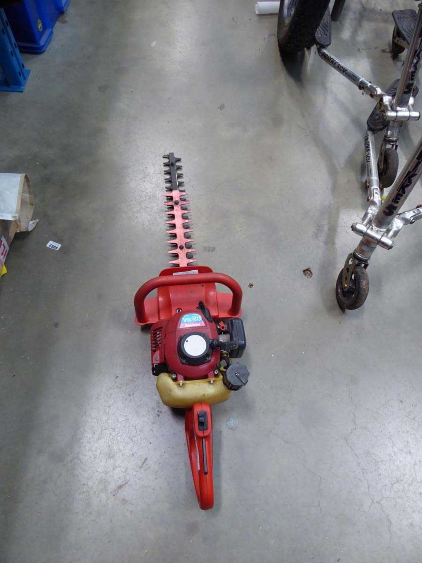 +VAT Red petrol powered hedge cutter