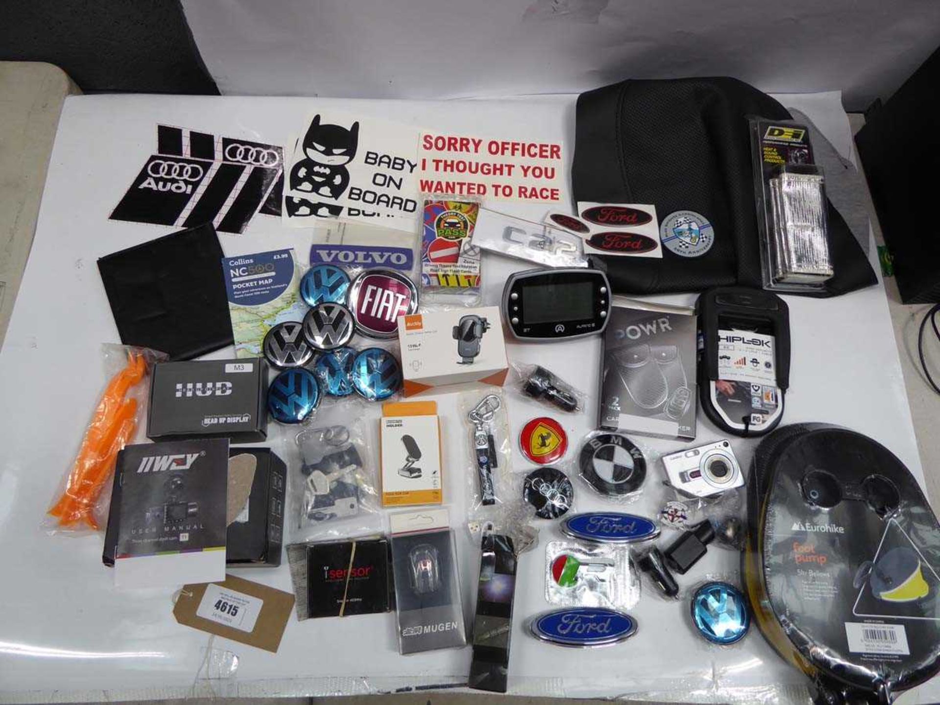 +VAT Bag containing car related items including badges, HUD, dash cam, steering lock, TPMS sensor