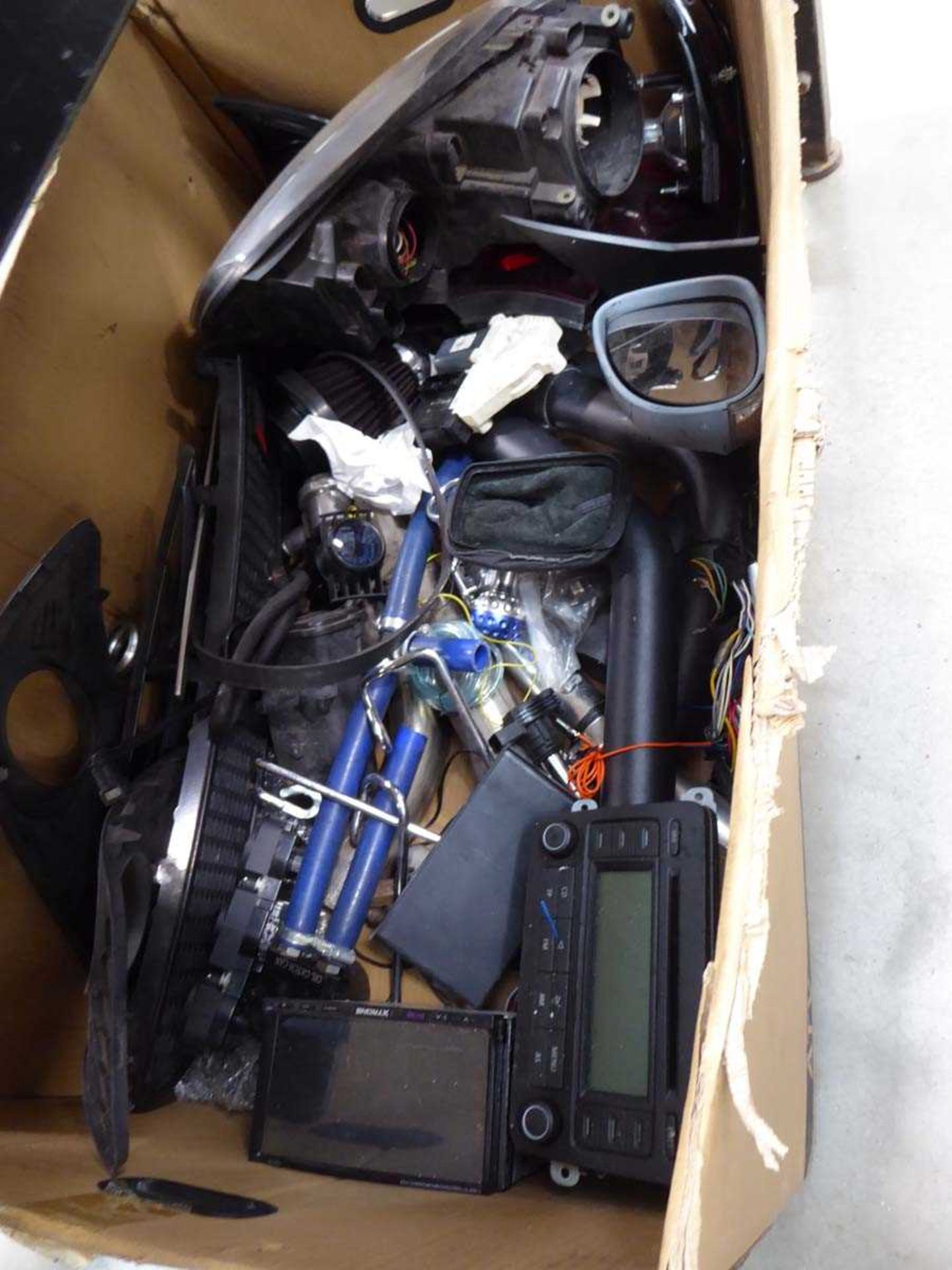 Box of assorted car parts and accessories